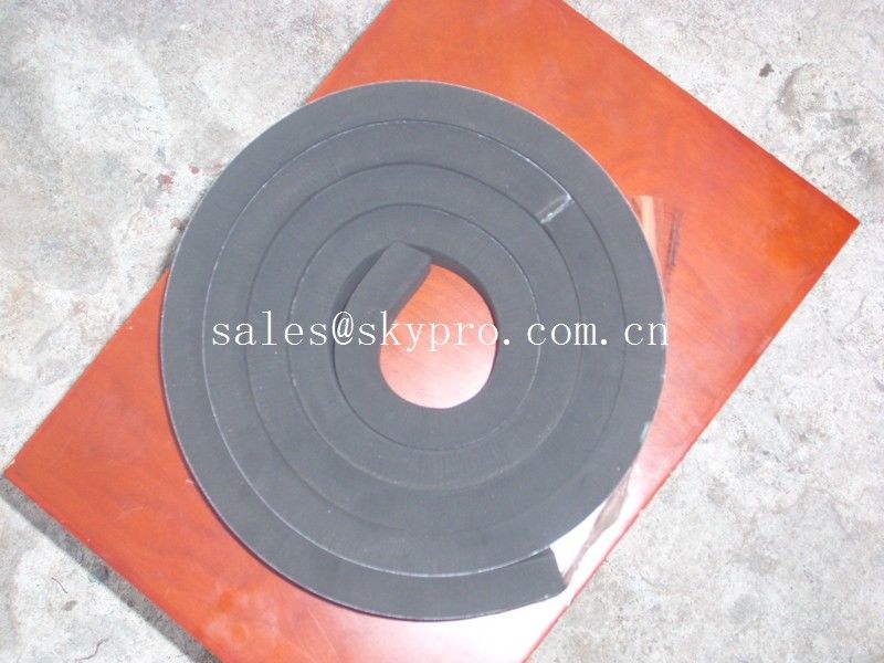 Black neoprene tape strip with self-adhesive PSA backing one side